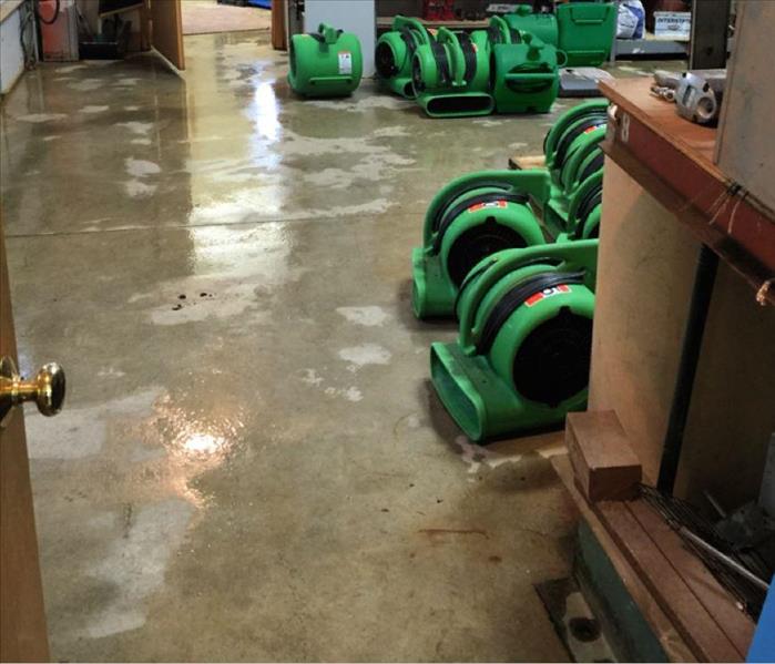Green drying equipment on a wet concrete floor